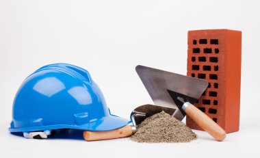 Mavi işçisi, kum yığını ve mason mala