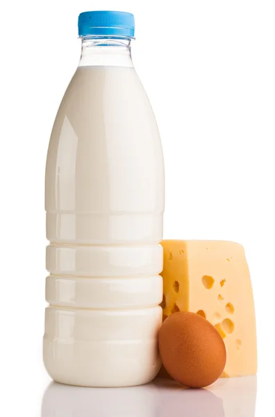 Milk bottle, cheese and egg — Stock Photo, Image