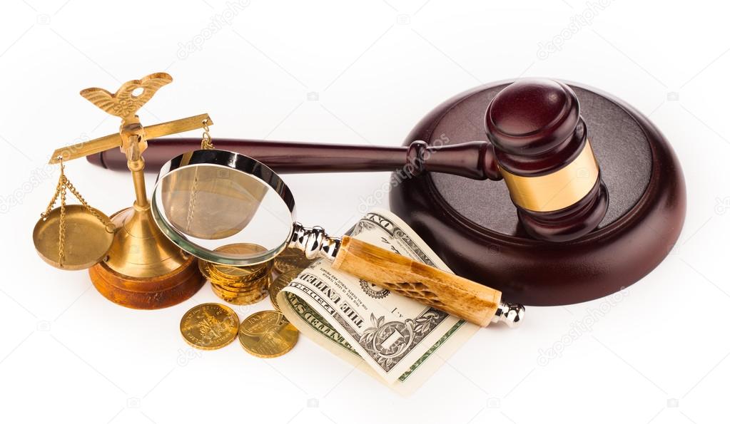 Scales,gavel, money and magnifying glass