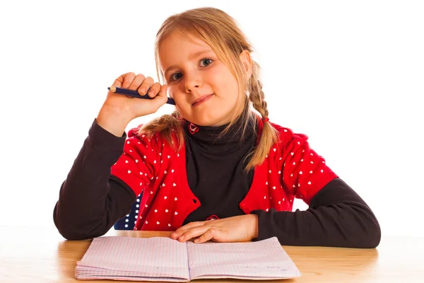 Linda niña está escribiendo — Foto de Stock