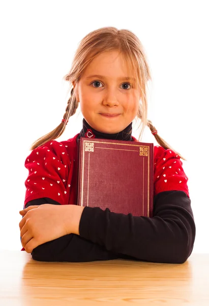 Girl is holding a book — Stock Photo, Image