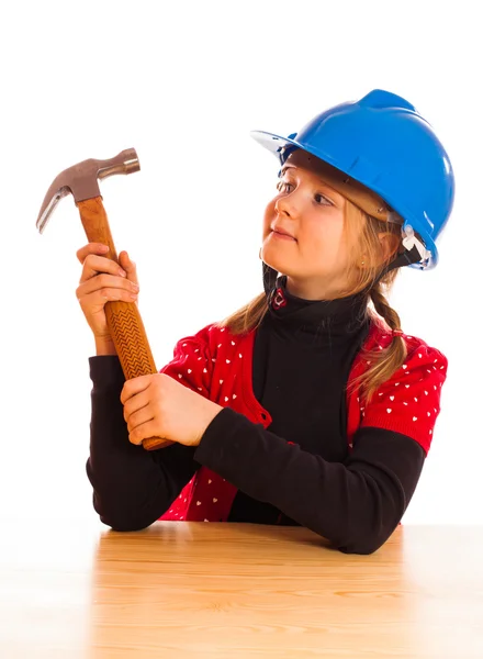 Girl and the construction helmet — Stock Photo, Image