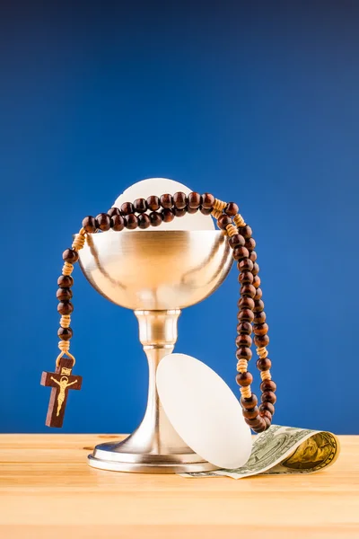 Holy communion and money — Stock Photo, Image