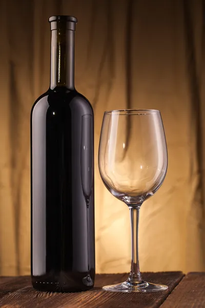 Wine bottle with glass — Stock Photo, Image