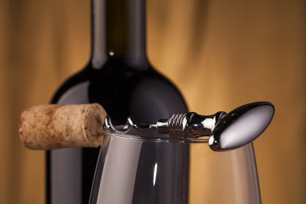 Corkscrew glass and wine bottle — Stock Photo, Image