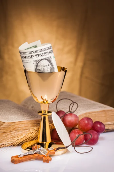 Holy communion and dollar bill — Stock Photo, Image