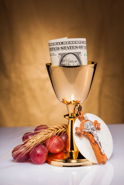 Holy communion and dollar bill — Stock Photo, Image