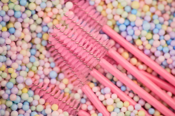 Pink eyelash brushes, accessories for eyelash extensions.