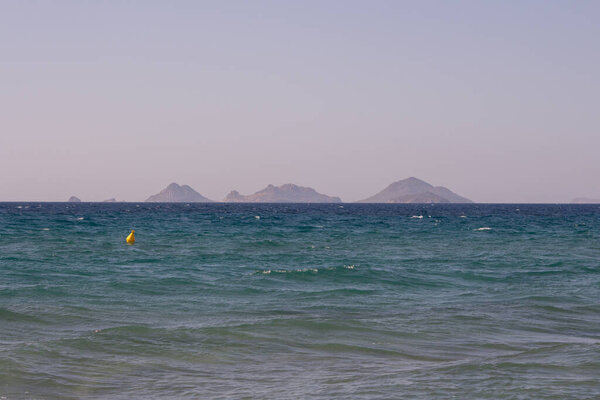 Песчаный пляж в Острове Кос, Греция, Эгейское море
