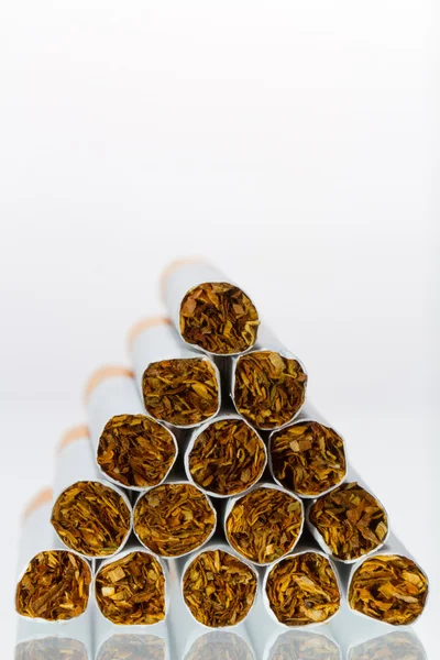 Close up of a smoking cigarettes in a stack — Stock Photo, Image