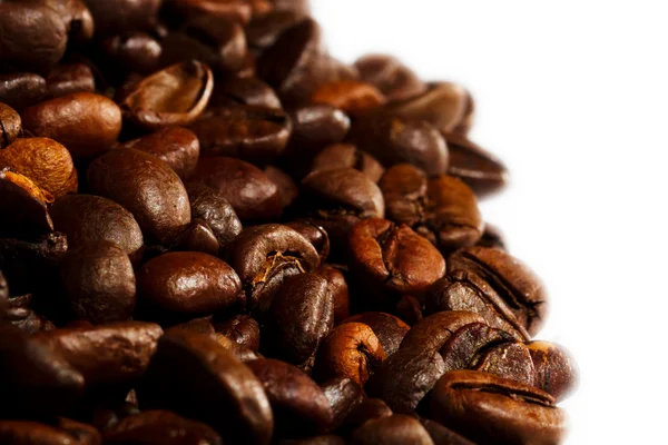 Hintergrund mit vielen gerösteten Kaffeebohnen — Stockfoto