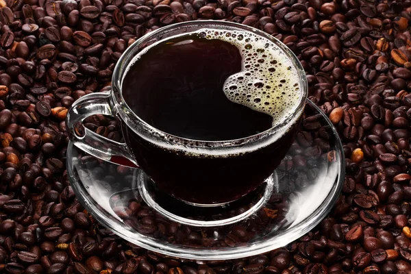 Granos de café y taza — Foto de Stock