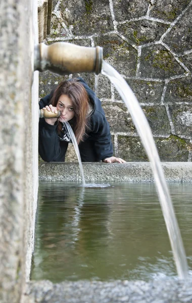 Drinking girl — Stock Photo, Image