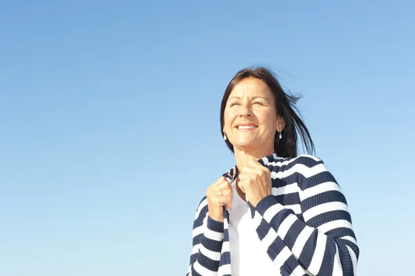 Happy relaxed mature woman outdoor — Stock Photo, Image