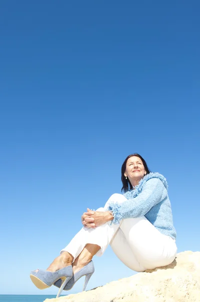 Happy sexy mature woman ocean — Stock Photo, Image