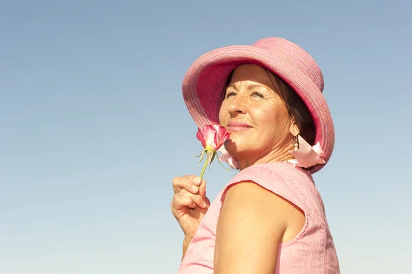 Lady in pink and rose — Stock Photo, Image