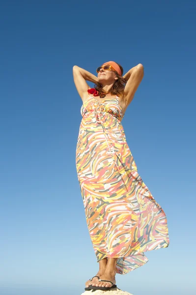 Confident relaxed successful woman mountain top — Stock Photo, Image