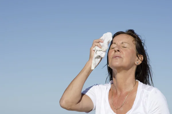 Mature woman menopause stress sweating — Stock Photo, Image