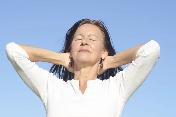 Relaxed happy mature woman outdoor — Stock Photo, Image