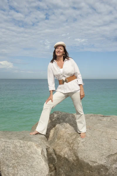 Attractive mature woman ocean isolated — Stock Photo, Image