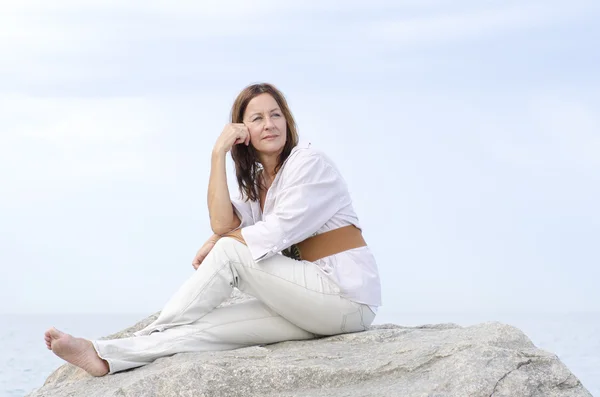 Mature woman serene relaxed outdoor isolated — Stock Photo, Image