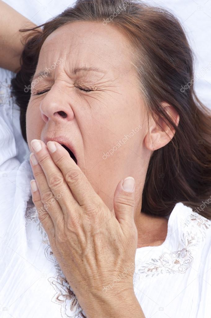Old Mature Woman Tired After House Chores