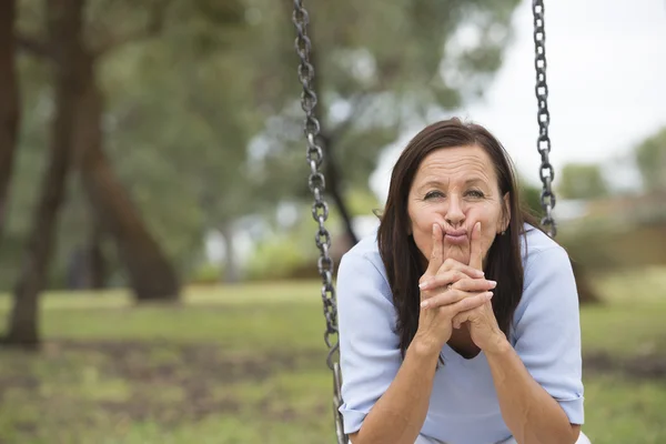 Concerned worried mature woman outdoor — Stock Photo, Image