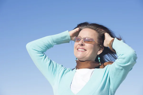 Beautiful happy mature woman outdoor — Stock Photo, Image