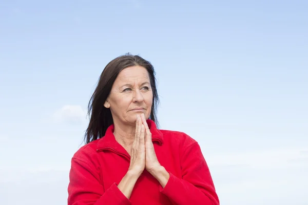 Concerned thoughtful woman praying hands — Stock Photo, Image