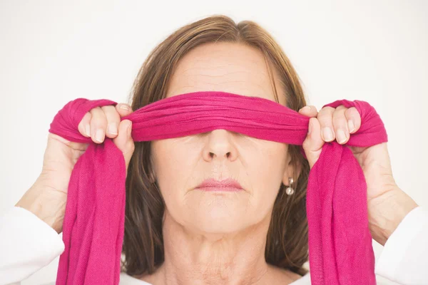 Portrait middle aged woman blindfolded — Stock Photo, Image