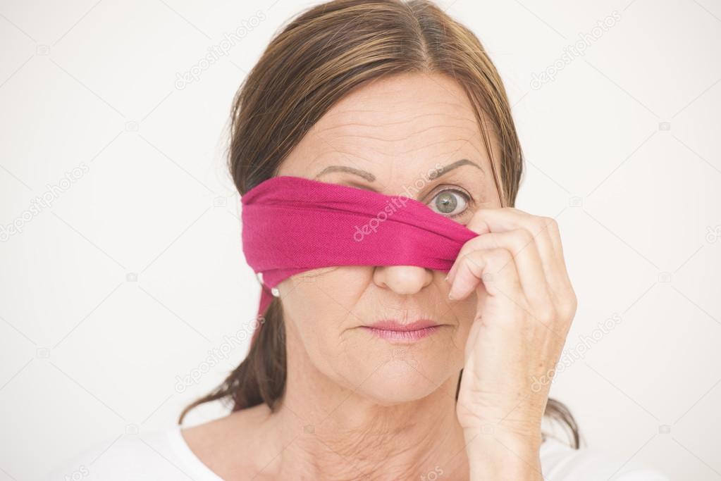 One eye blindfolded woman