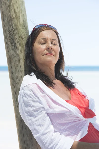 Relaxed attractive senior woman on vacation — Stock Photo, Image