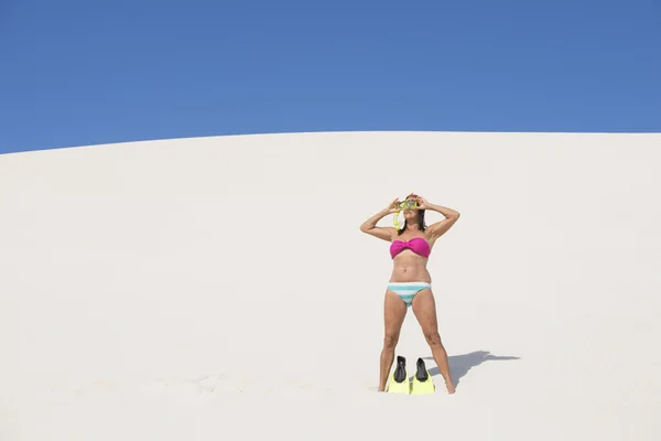 Active retired woman on beach sand dune — Stock Photo, Image