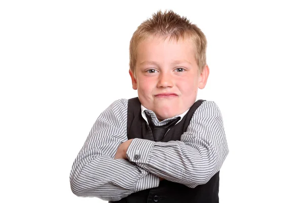 Young boy looking grumpy — Stock Photo, Image