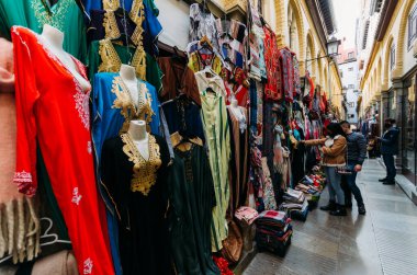 Granada, Spain - December 28, 2021: Alcaiceria market known as the Grand Bazaar of Granada represents the original Moorish market of silk, spices and other valuable goods.