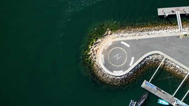 Downwards Spiral Helicopter Helipad Next Boats Water — Vídeos de Stock