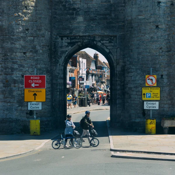 Canterbury July 2022 Two People Walking Bikes Front Westgate Canterbury — Fotografia de Stock