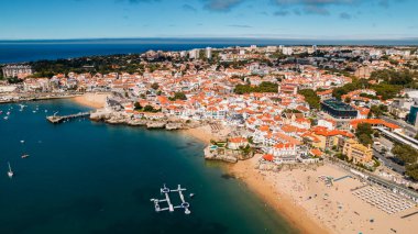 Aerial view of Conceicao and Duquesa beaches in Cascais, Portugal during a summer day