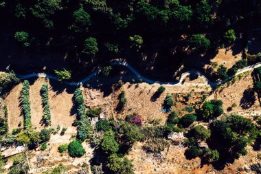 Top down aerial view of hiking path at Ribeira das Vinhas in Cascais, Portugal - translated to Vineyards Trail