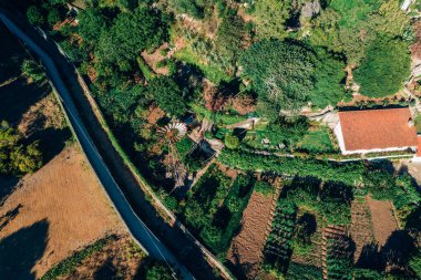 Top down aerial view of hiking path at Ribeira das Vinhas in Cascais, Portugal - translated to Vineyards Trail