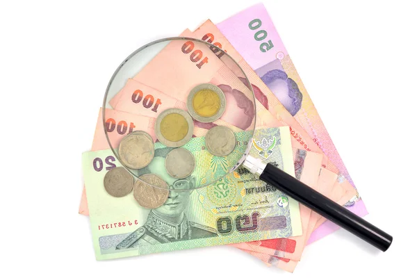 Magnifying glass on money — Stock Photo, Image