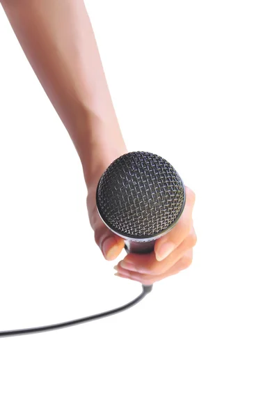 Mulher mão com microfone — Fotografia de Stock