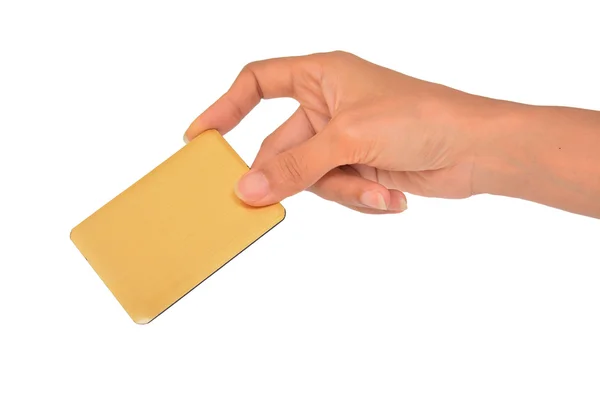 Kartu kuning di tangan seorang wanita — Stok Foto