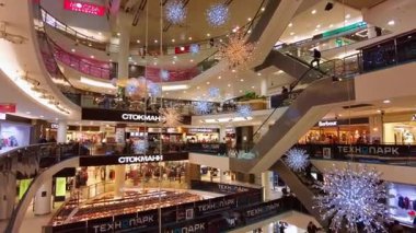 Saint-Petersburg, Russia - Circa November 2021. Interiors of shopping mall in Saint-Petersburg, decorated for New Year's Eve.