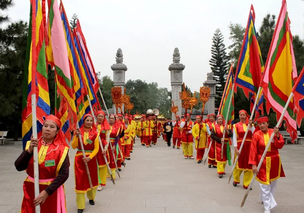 Group of people in traditional costume give gifts to the holy — Stock Photo, Image