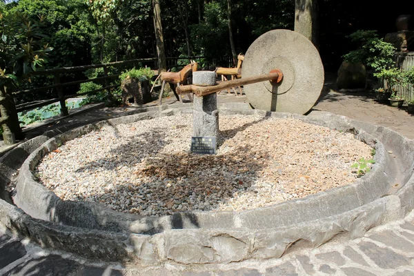 Old stone mortar for Rice processing in vietnam — Stock Photo, Image