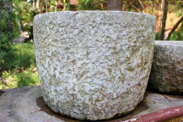 Old stone mortar for Rice processing in vietnam — Stock Photo, Image