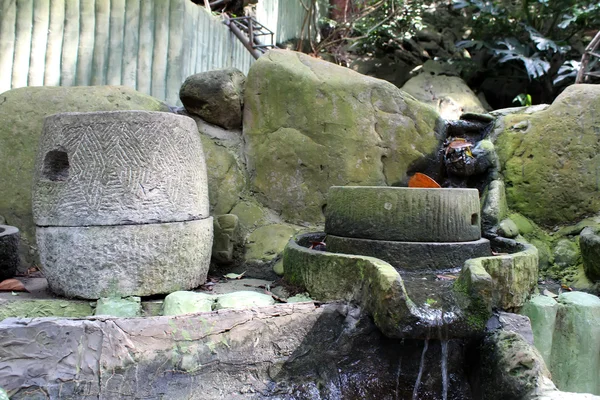 Old stone mortar for Rice processing in vietnam — Stock Photo, Image