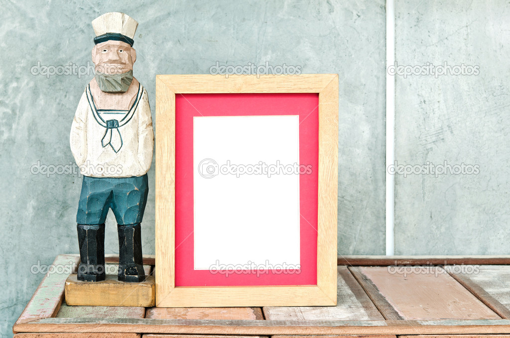 Wood frame and Old sailor toy