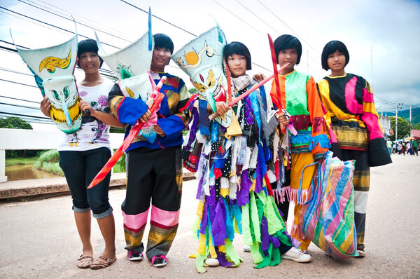 An unidentified children aged 11-14 years wear ghost costumes